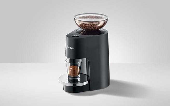 Compact, premium P.A.G. grinder design matching JURA aesthetics